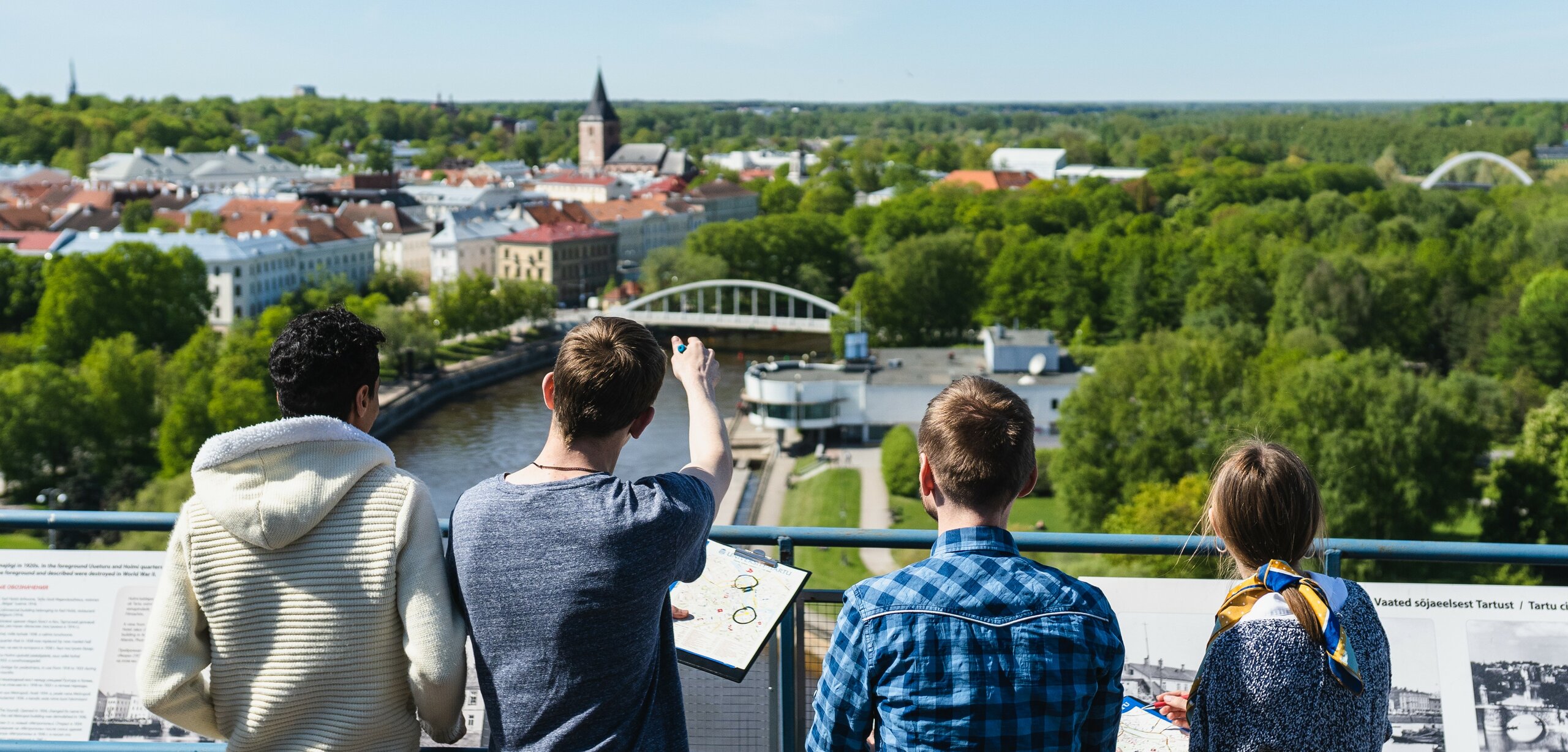 Students in tartu on top of a skyscraper taking a look over Tartu.